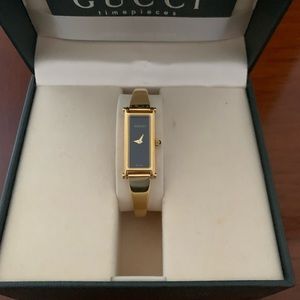 Gucci gold plated stainless steel watch